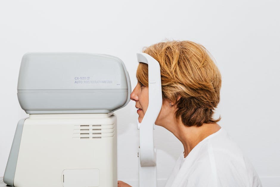 Mature woman having a comprehensive eye examination — essential eye health checks after 50